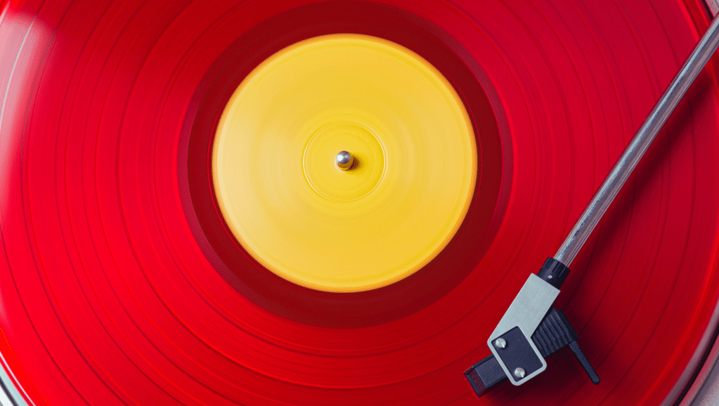 Red vinyl LP on a turntable